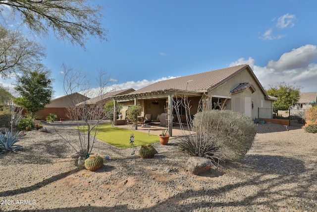 back of house featuring a patio