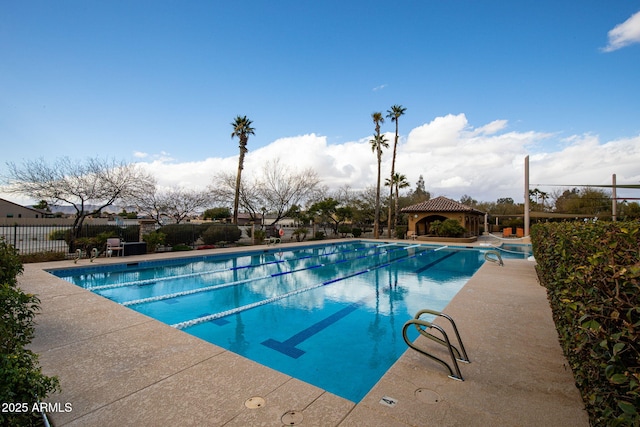 view of swimming pool featuring a gazebo