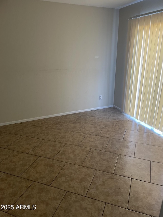 view of tiled spare room