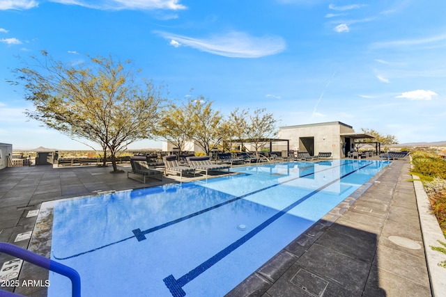 view of swimming pool featuring a patio