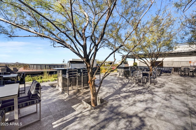 view of patio with a bar