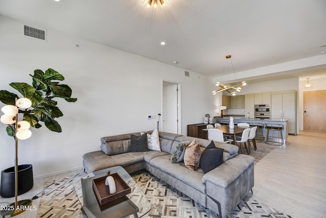 living room with a chandelier