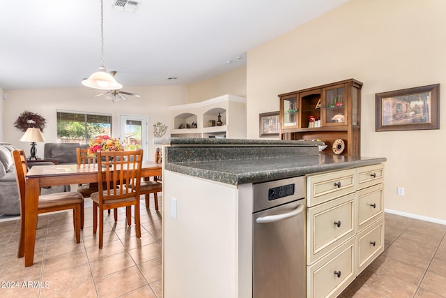 kitchen featuring ceiling fan, light tile patterned floors, vaulted ceiling, and cream cabinetry