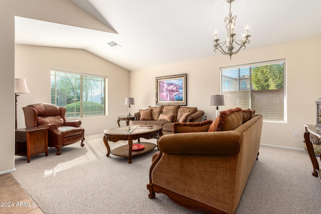 carpeted living room with lofted ceiling and an inviting chandelier