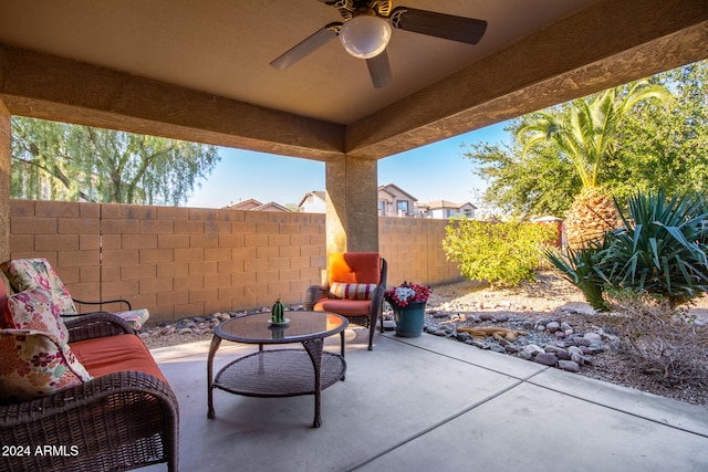 view of patio featuring ceiling fan