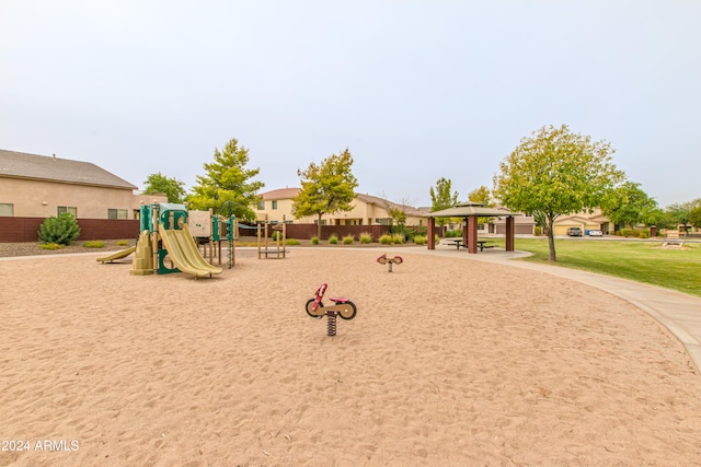 view of play area featuring a lawn