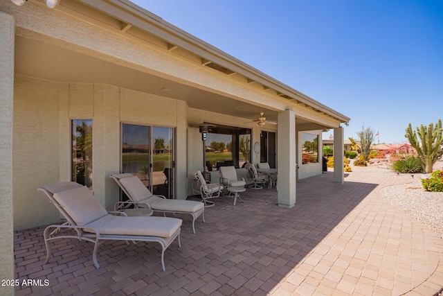 view of patio with a ceiling fan