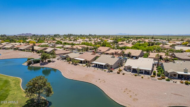bird's eye view featuring a residential view and a water and mountain view