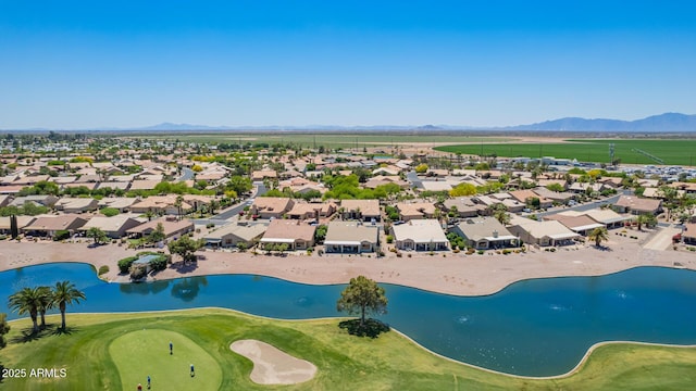 bird's eye view with a residential view and a water and mountain view