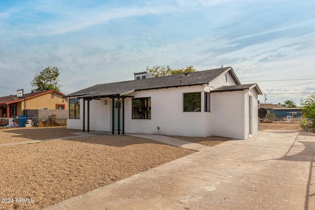 single story home with stucco siding, a patio area, and fence