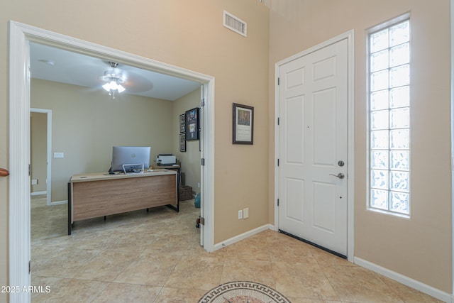 21841 N Ingram Ct, Maricopa, AZ 85138 - foyer with light tile patterned flooring, baseboards, and ceiling fan