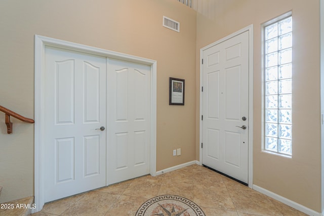 21841 N Ingram Ct, Maricopa, AZ 85138 - foyer featuring baseboards and light tile patterned floors