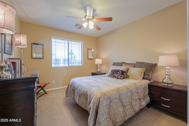 21841 N Ingram Ct, Maricopa, AZ 85138 - bedroom with carpet, baseboards, and a ceiling fan