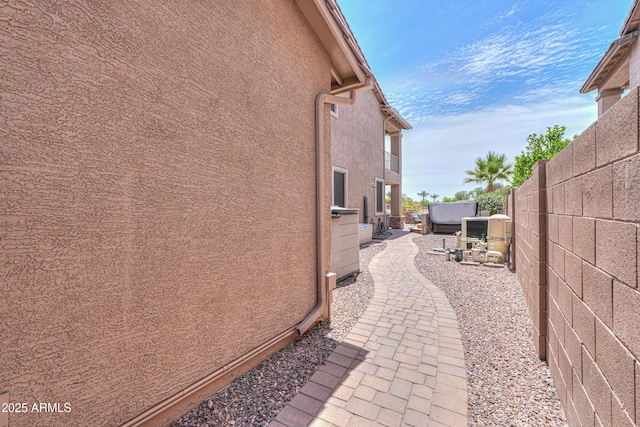 21841 N Ingram Ct, Maricopa, AZ 85138 - view of side of home featuring stucco siding