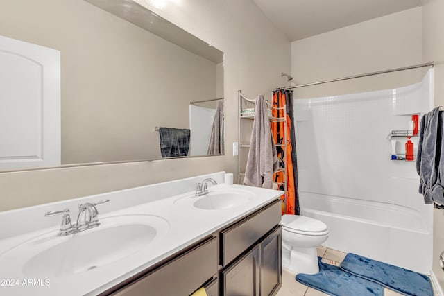 full bath with shower / bath combination with curtain, toilet, double vanity, and a sink