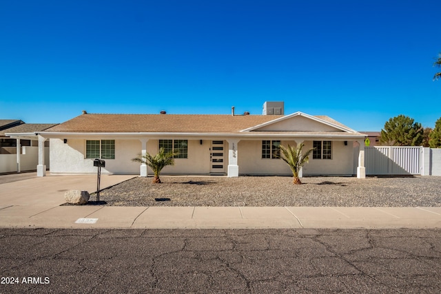 ranch-style house with central AC