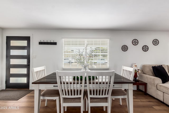 dining space featuring dark hardwood / wood-style floors