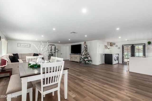 dining area with dark wood-type flooring