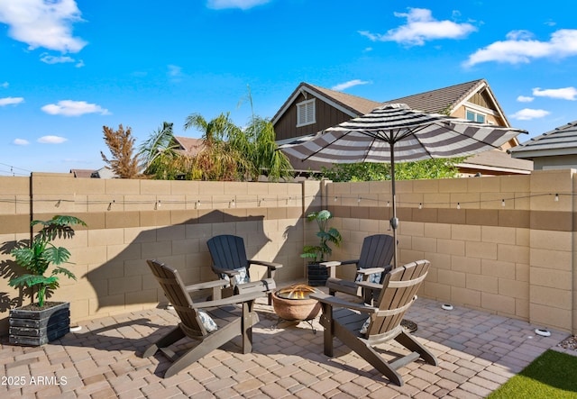4341 E Evelyn St, Gilbert, AZ 85295 - view of patio with a fire pit