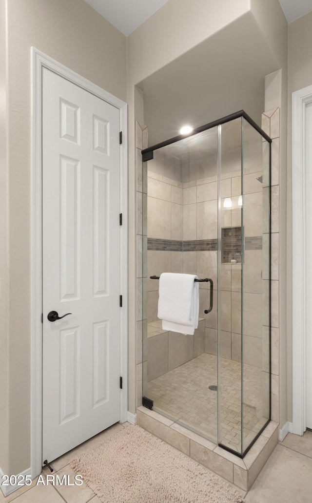 4341 E Evelyn St, Gilbert, AZ 85295 - bathroom with a shower stall and tile patterned floors