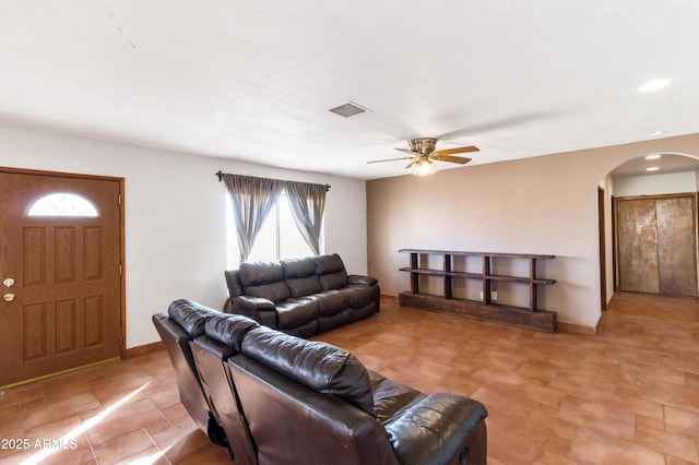 living room with ceiling fan