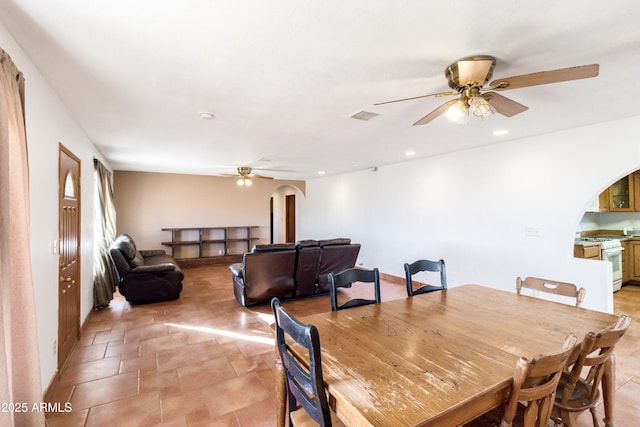 dining room with ceiling fan