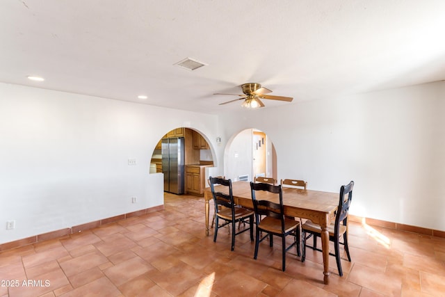 dining room with ceiling fan