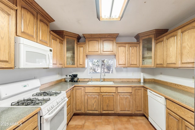 kitchen featuring sink and white appliances