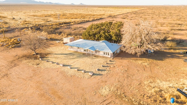 birds eye view of property featuring a rural view and a mountain view