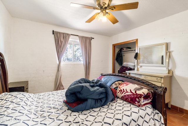 bedroom featuring ceiling fan and tile patterned floors