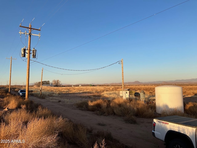 view of street featuring a rural view and a mountain view