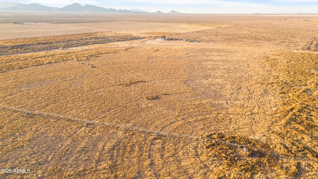 drone / aerial view featuring a mountain view