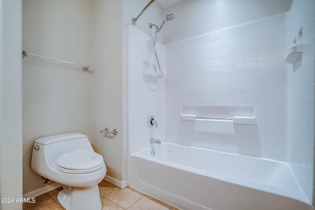 bathroom with tile patterned flooring, toilet, and shower / tub combination