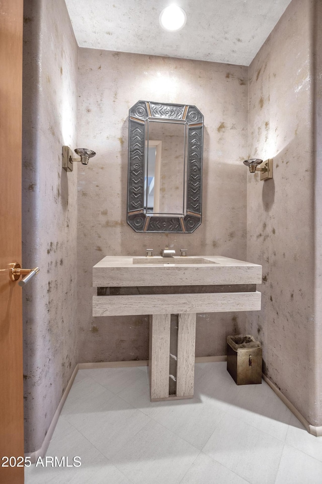 bathroom featuring tile patterned flooring