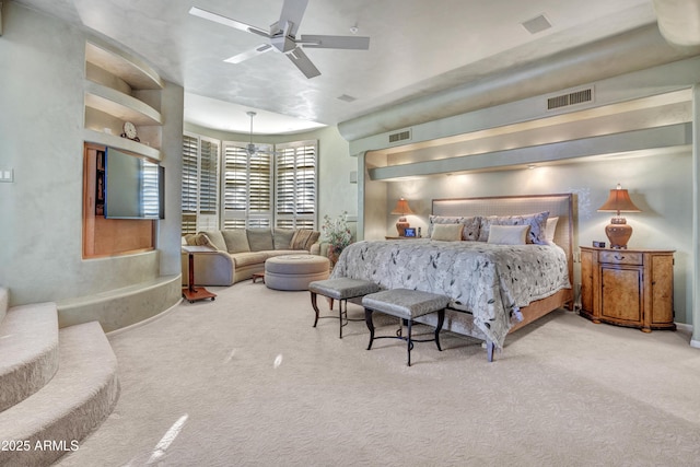 carpeted bedroom with ceiling fan