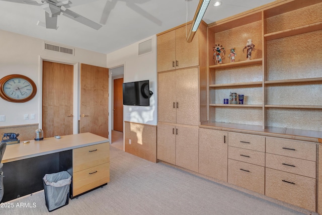 office with ceiling fan and light colored carpet