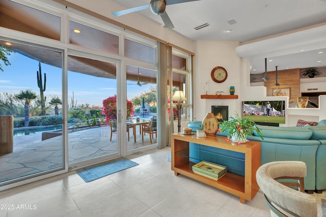 living room with ceiling fan