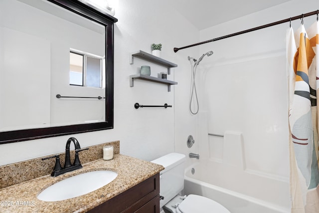 full bathroom featuring vanity, toilet, and shower / bath combo with shower curtain