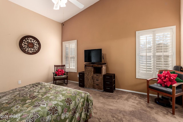 bedroom with ceiling fan, high vaulted ceiling, and light carpet