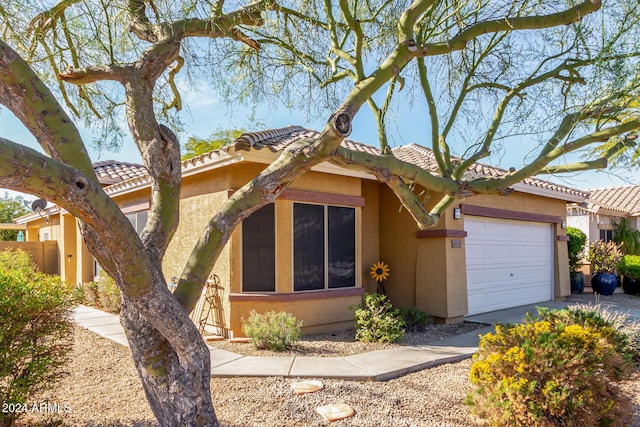 view of front of property featuring a garage