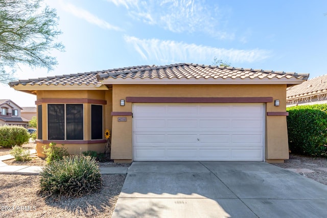 view of front of home with a garage