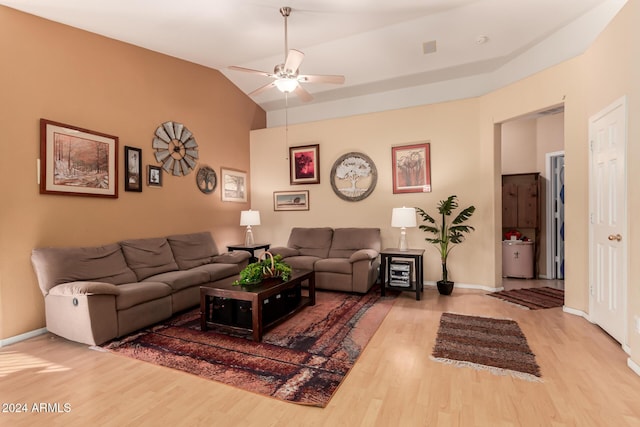 living room featuring ceiling fan, wood-type flooring, and lofted ceiling