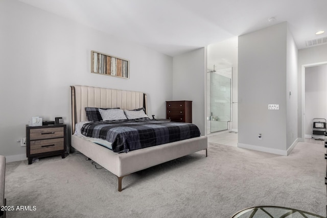 carpeted bedroom featuring connected bathroom