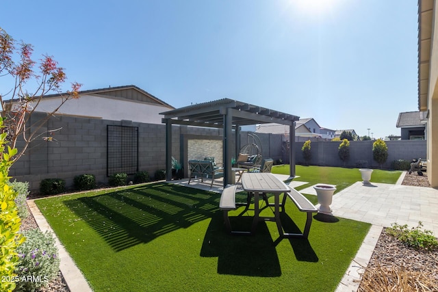 view of yard with a pergola and a patio area