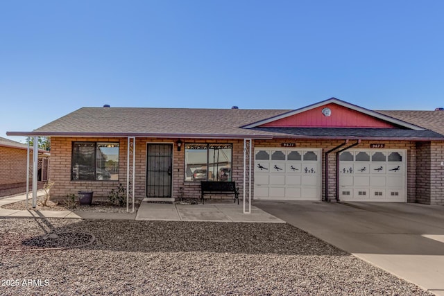 single story home featuring a garage