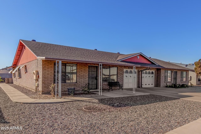 ranch-style house featuring a garage