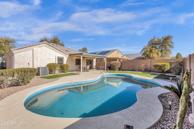 view of pool with a patio and central AC