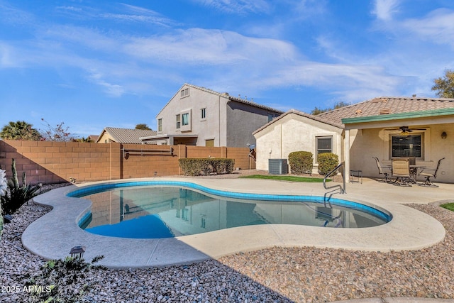 view of swimming pool with central AC unit, ceiling fan, and a patio area