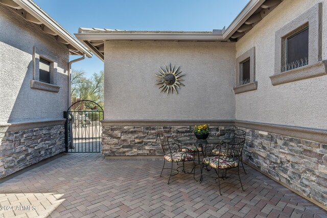 4126 S Last Chance Trl, Gold Canyon, AZ 85118 - view of patio / terrace with a gate
