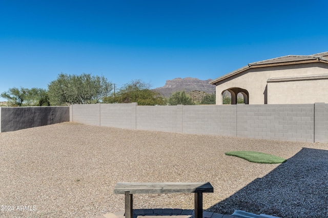 4126 S Last Chance Trl, Gold Canyon, AZ 85118 - fenced backyard with a mountain view